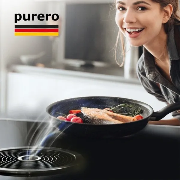 Lifestyle-Szene für purero Dunstabzugshauben-Filter mit Frau beim Kochen am Herd in einer modernen Küche